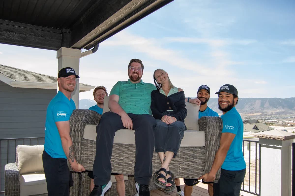 Team lifting furniture